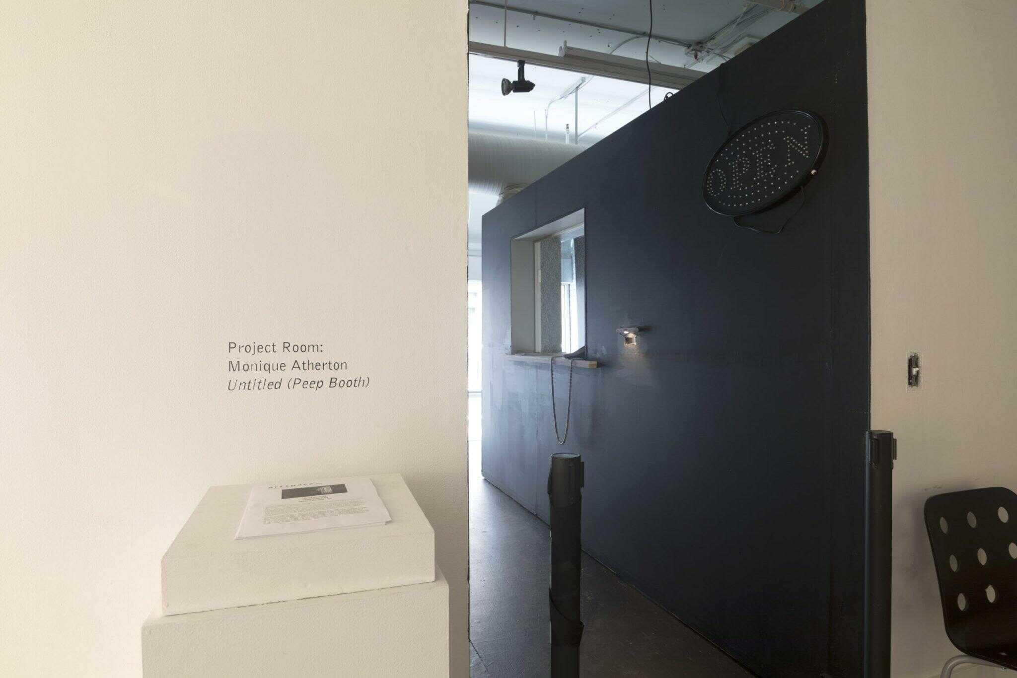 Installation image of "Monique Atherton: Untitled (Peep Booth)"; Jessica Smolinski.