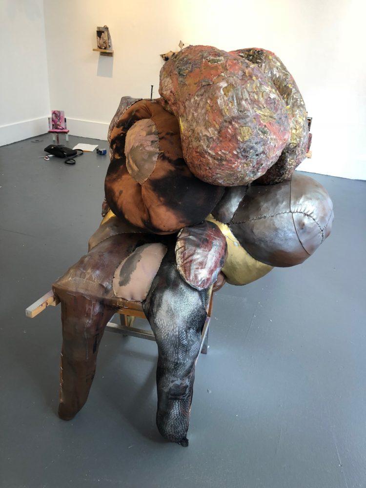 Anahita Vossoughi, Golden Staples Sit Squat, 2018. Clay, Paint, Ink, Plaster, Wax, Wood, Foam, Found Materials and Objects.