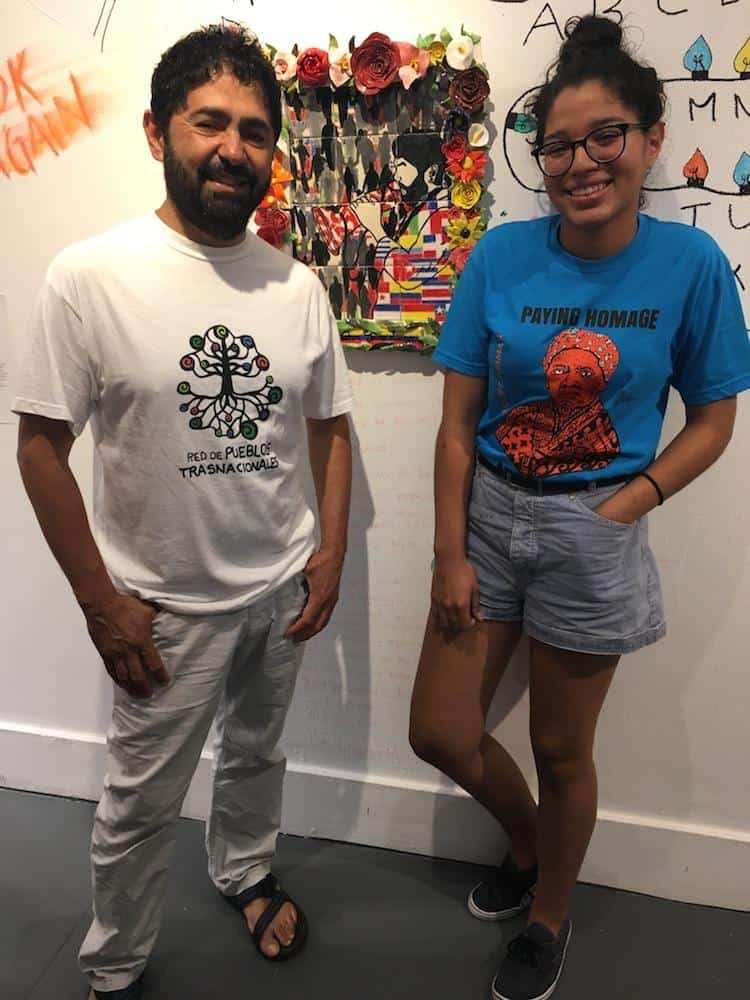 Artist Natalia Maria Padilla Castellanos with John Jairo Lugo, in front of Natalia's work "Waving Flag" honoring John, 2018. Photo credit Artspace Staff.